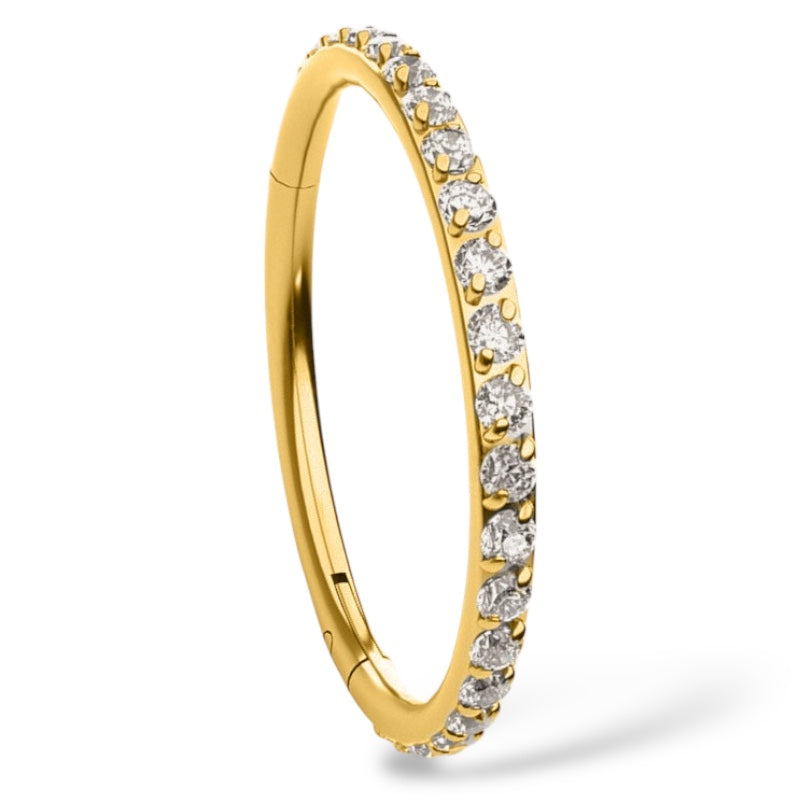 Tytanowy, złoty Clicker z cyrkoniami na szczycie.